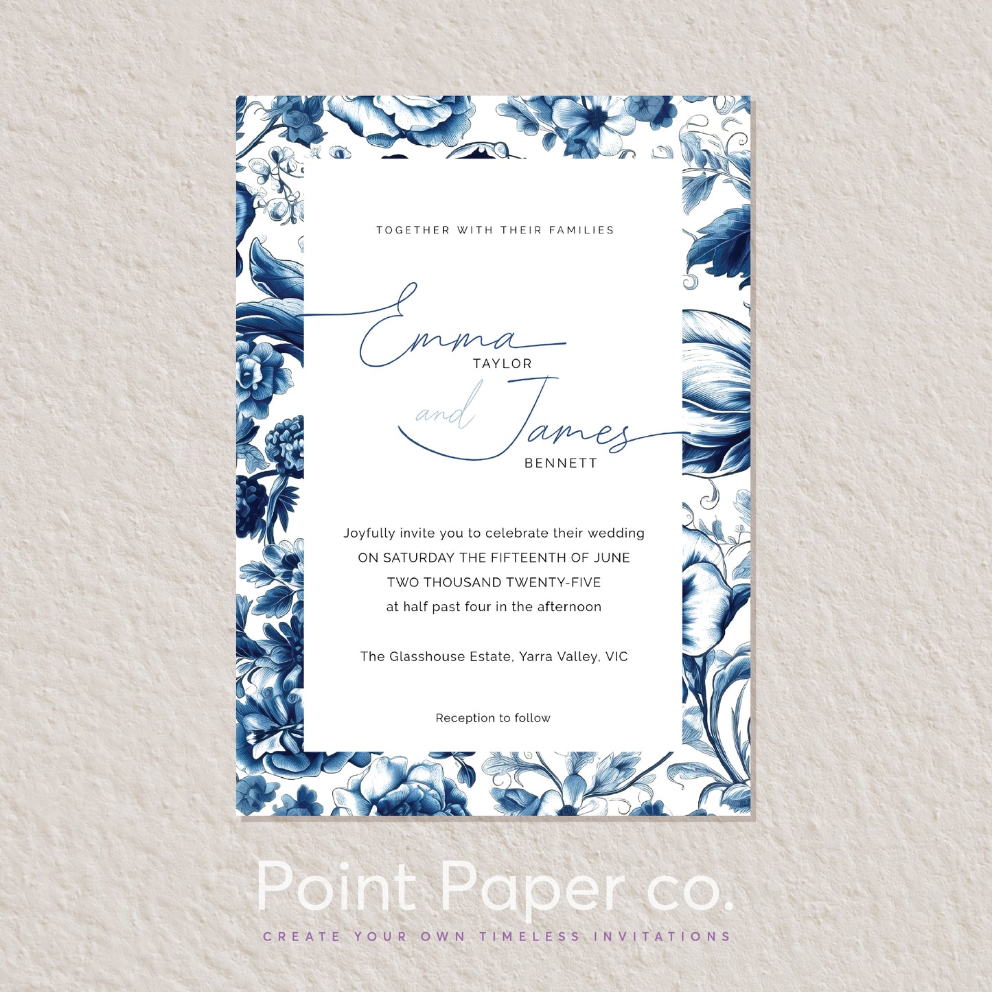A wedding invitation card with a white center panel and a blue floral damask border, shown on a light textured background. The card includes placeholder names Emma and James and wedding event text.