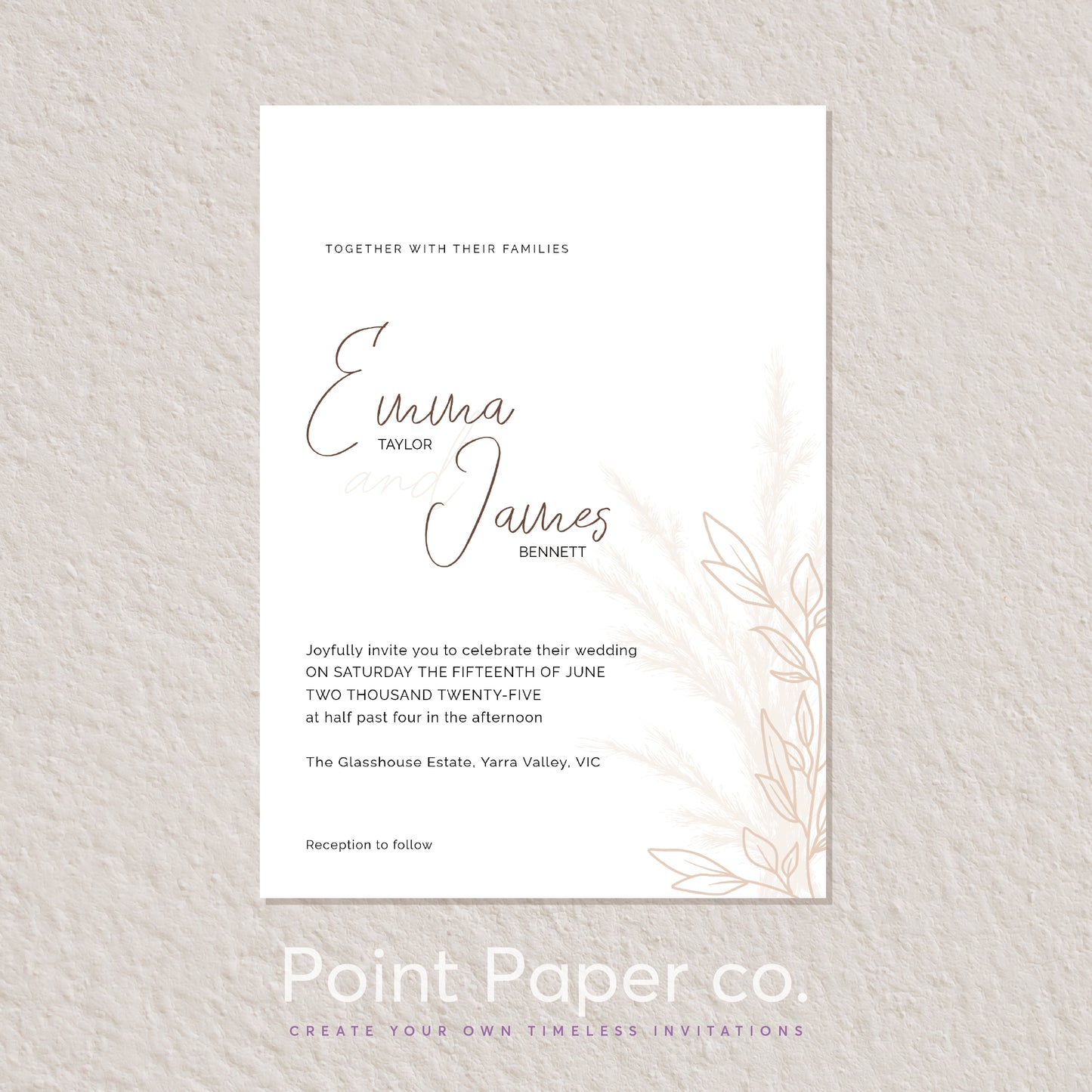 A wedding invitation card with elegant script names 'Emma Taylor' and 'James Bennett,' printed on a white card with soft beige botanical line art, shown against a light textured wall. The card is branded with 'Point Paper co.