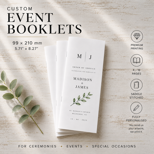 Three white event booklets for a wedding are displayed on a light wood background with a green eucalyptus branch. The image includes promotional text and feature icons for custom event booklets, 99 x 210 mm size, premium printing, 4-18 pages, saddle stitched, and fully personalised.