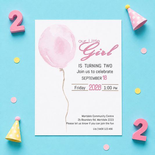 A two-year birthday invitation card for a girl, styled in a flat-lay on a bright blue background with pink and yellow party decorations, including paper hats, confetti, and wooden numbers.