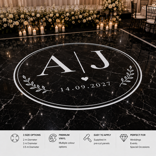 A personalized round marble floor decal with the initials 'AJ', a small heart, and the date '14.09.