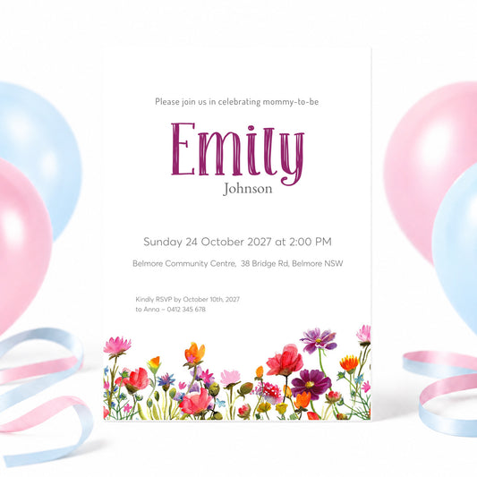 A baby shower invitation card for 'Emily Johnson' with a white background, pink and blue balloons, and a colorful floral border at the bottom.